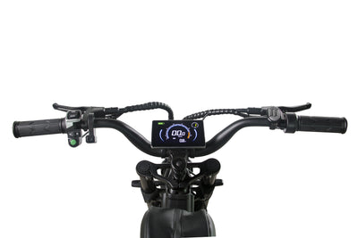Handlebar view of a black electric motorcycle with digital display and controls.