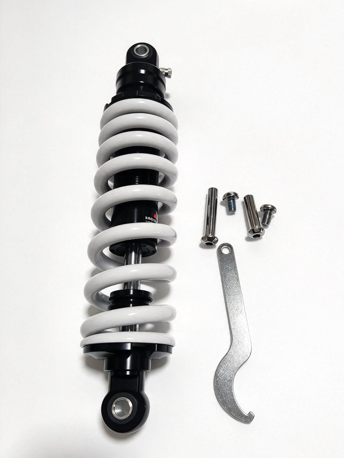 QF200 shock absorber with white coil spring, black body, wrench and mounting bolts