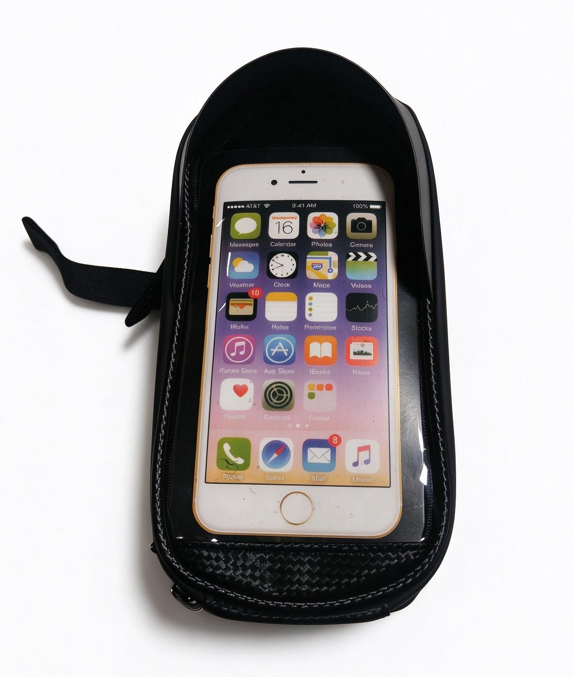 Black phone shoulder bag with zip pocket and clear phone window, bow tie strap.