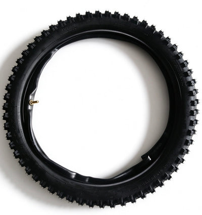 QF200 tire with black knobby tread and gold valve stem, angled overhead view