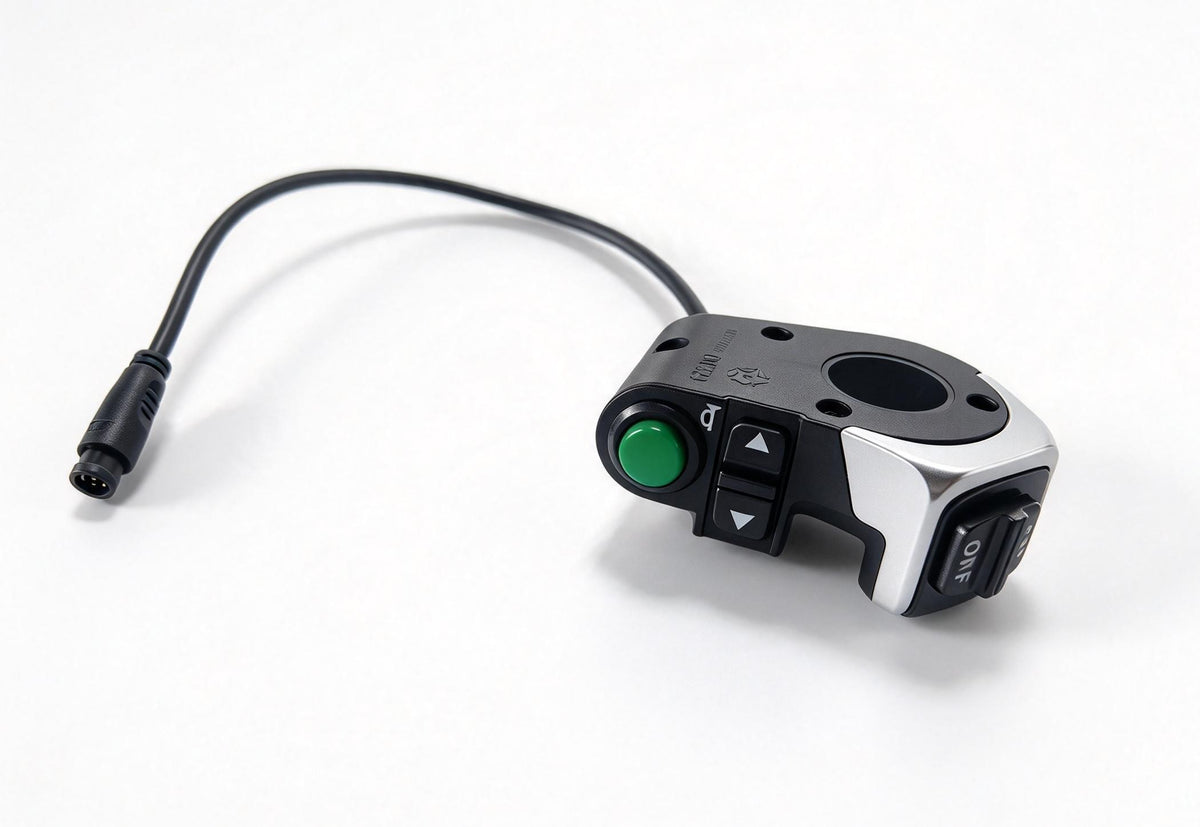 QF200 lighting switch shown from the side, with wired connector, green button and arrow controls