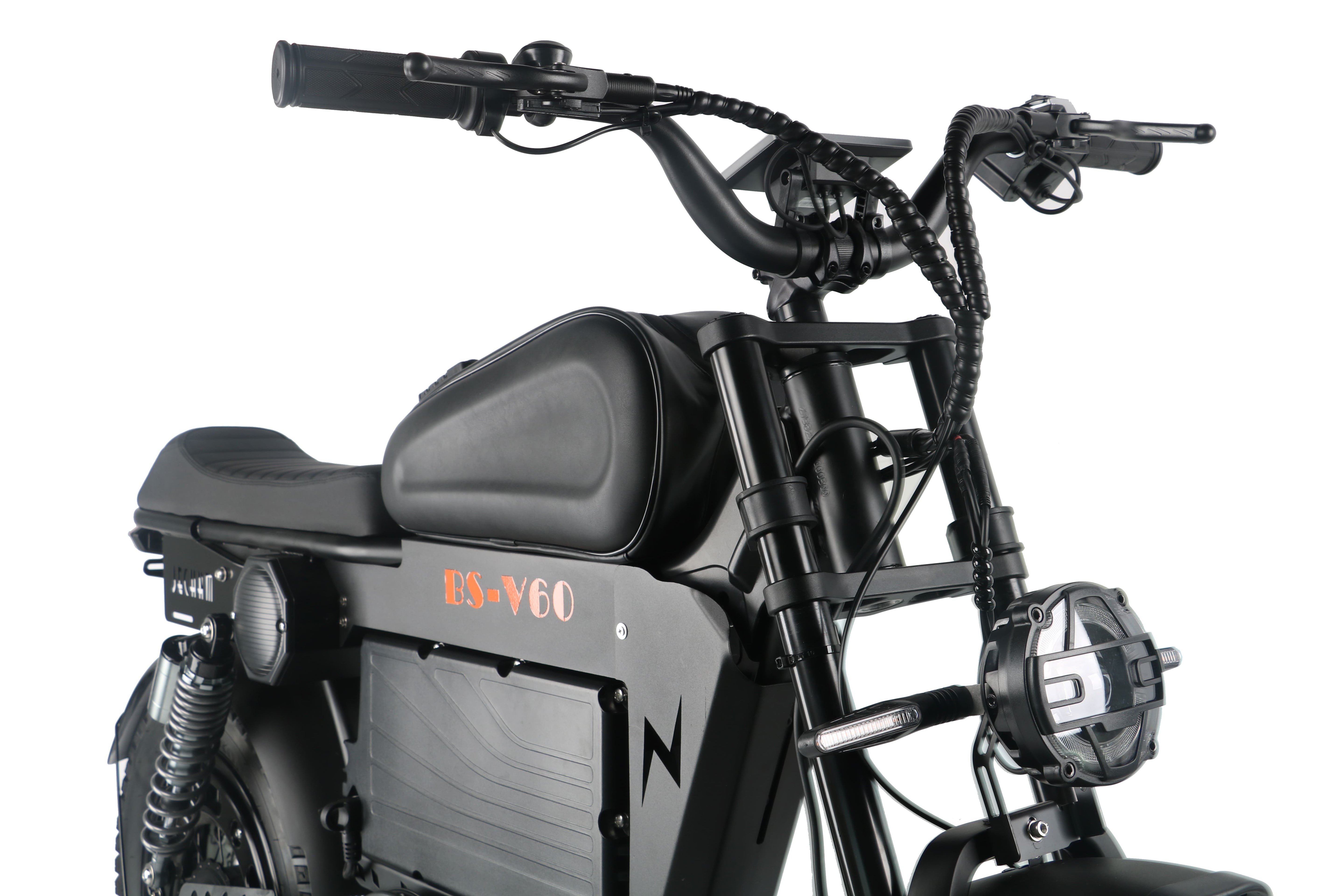 Black electric motorcycle handlebar and seat area with front headlight and wiring.