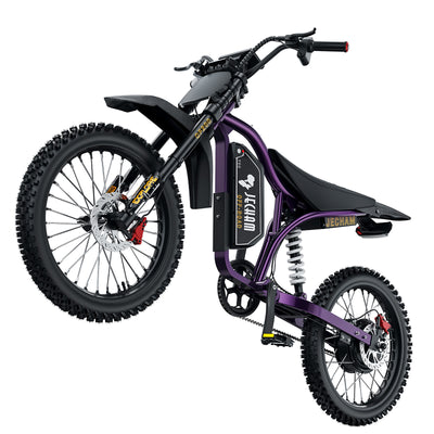 Purple and black electric dirt bike side view, knobby tires and disc brakes