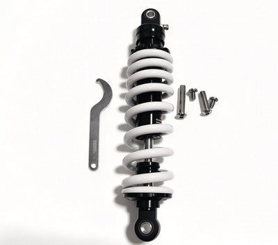 QF200 shock absorber and included wrench and mounting bolts, shown upright