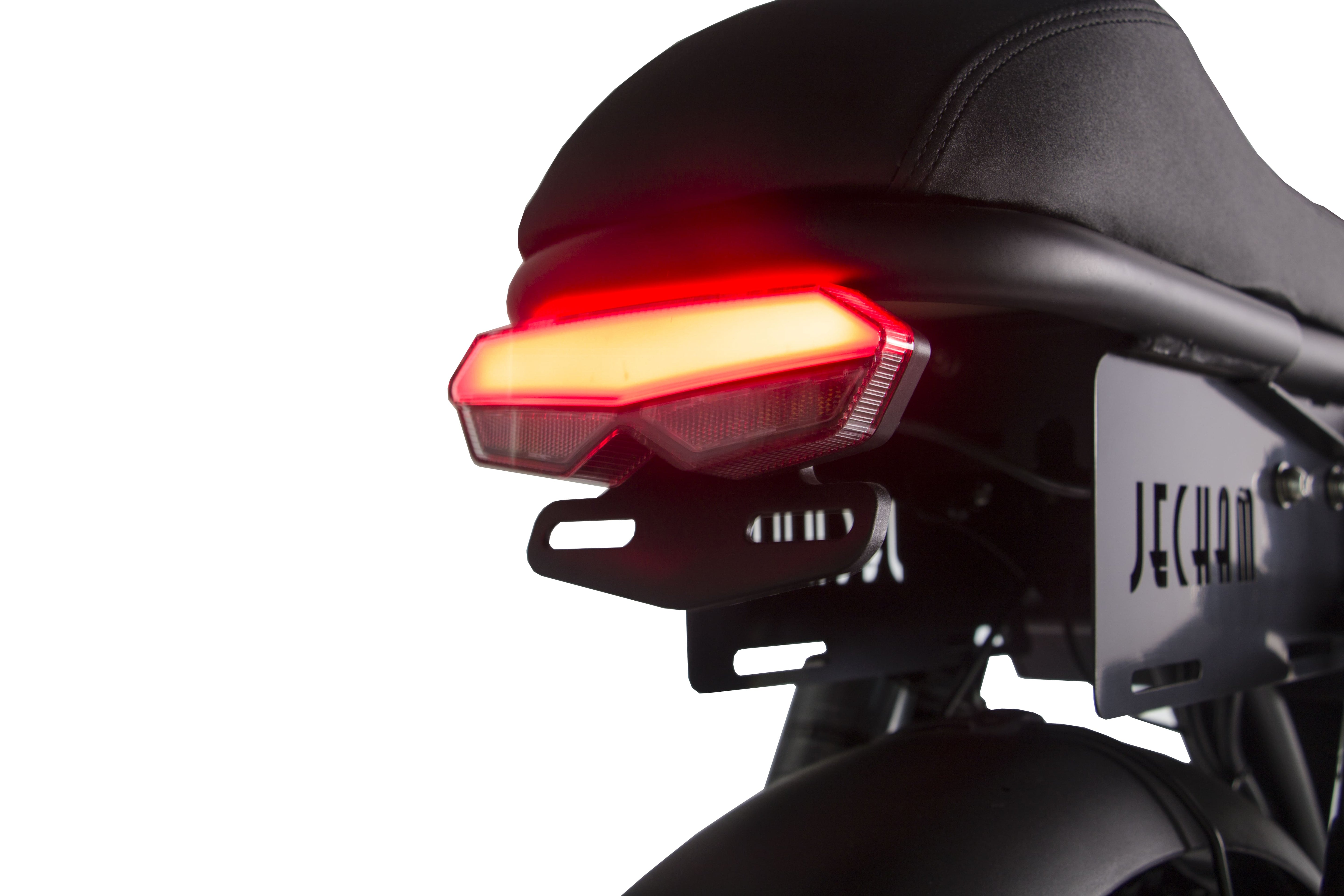 Rear light bar illuminated on a black electric motorcycle near the license plate.