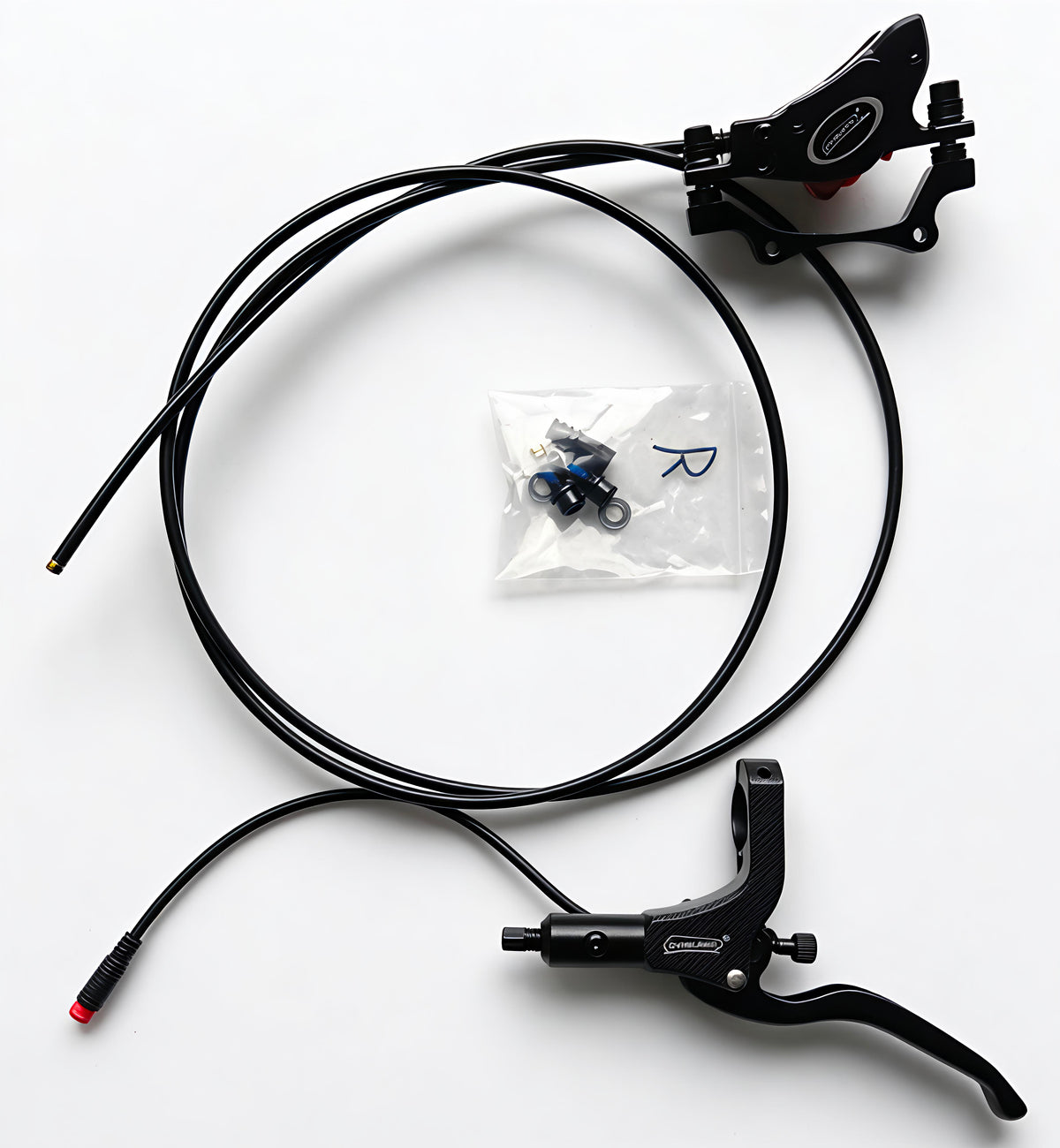Pair of hydraulic disc brake levers with black hoses and mounting parts pack
