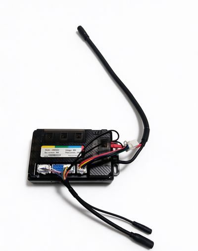 Electronic controller module with open interior circuit board and connected wiring harness